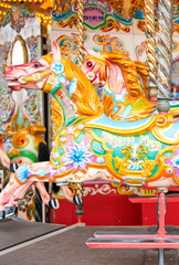 Beautiful decorated horse on a merry-go-round