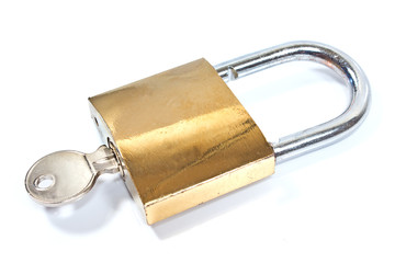 Padlock with key isolated on white