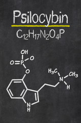 Schiefertafel mit der chemischen Formel von Psilocybin