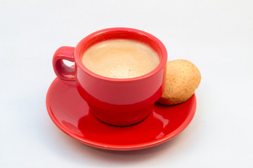 Red Coffee cup and saucer with coffee and biscuit