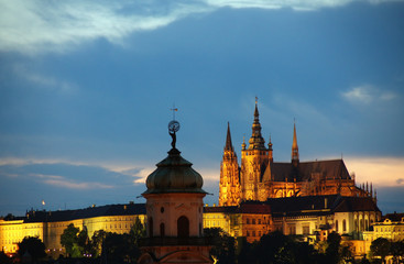 Fototapeta na wymiar Towers and rooftops of old Prague