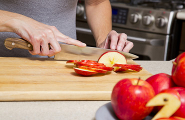 woman cutting apples