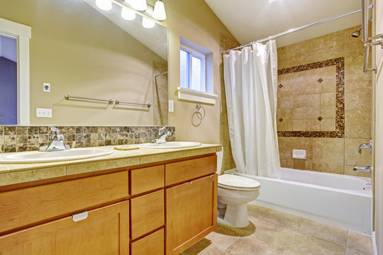 Bathroom with tile wall trim