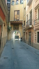 Fototapeta na wymiar Calle antigua con coche de caballos