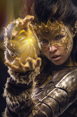 Woman in golden fantasy armour © FlexDreams
