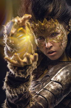 Woman in golden fantasy armour