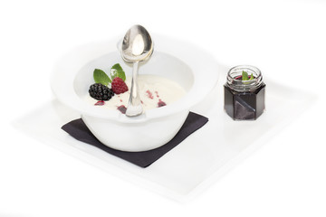 semolina with jam on a white background in the restaurant