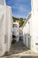 view of a street in frigiliana, pueblo blanco, spain