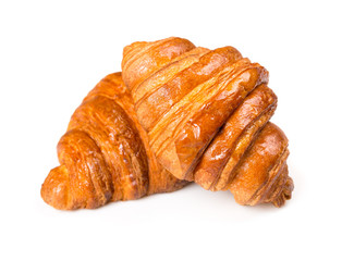 Fresh and tasty croissant over white
