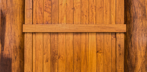 Wooden wall with beam and columns constructed from teak wood