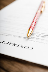 Pen on the contract papers