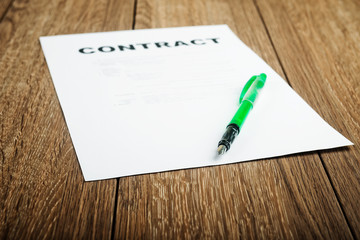 Pen on the contract papers