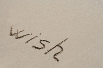 Conceptual text sand on beach