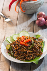 Thai food; spicy fried noodle with pork