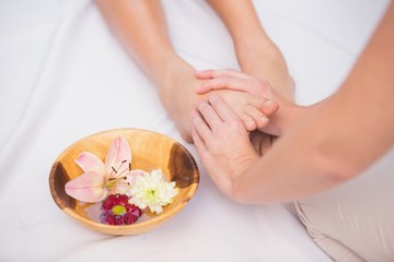 Obraz na płótnie Canvas Woman receiving a foot massage
