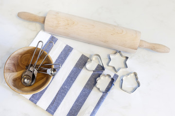 Baking tools with cookie cutters and measuring spoons