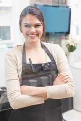 Hair stylist smiling at camera