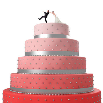 wedding cake topper with funny bride and groom situation