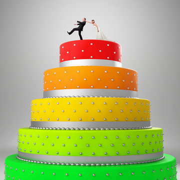 colorful wedding cake topper with funny bride and groom situation
