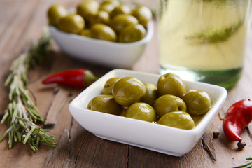Marinated olives on table close-up