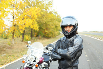 Obraz premium Biker man and his bike, outdoor