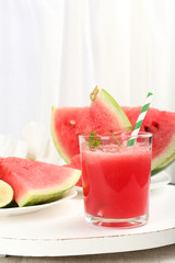 Watermelon cocktail on table, close-up