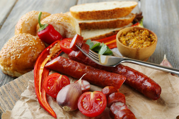 Smoked thin sausages and vegetables