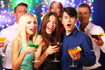 Young people dancing at party