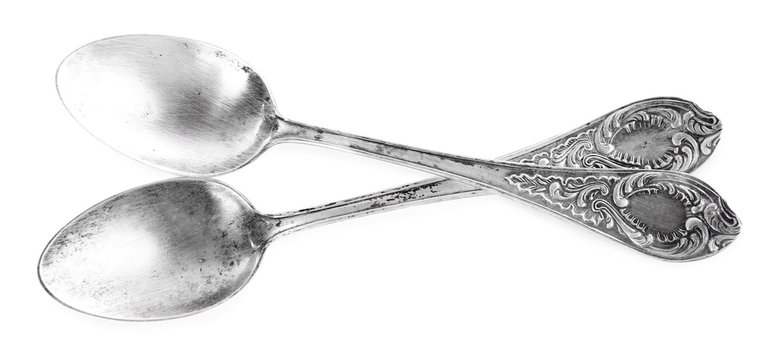 Pair of tablespoons isolated on white