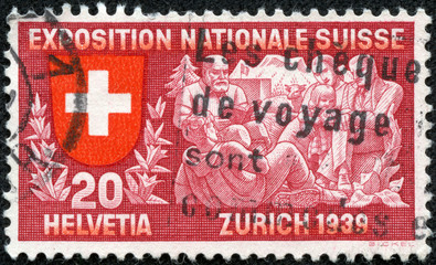 stamp printed in Switzerland shows coat of arms of confederation