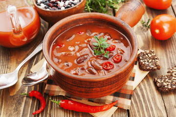 Chili soup with red beans and greens