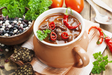 Chili soup with red beans and greens