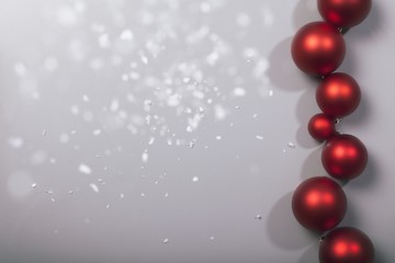 row of christmas balls with snowflakes