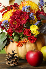 Beautiful autumn composition on table on bright background