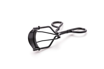 Black eyelash curler isolated on white