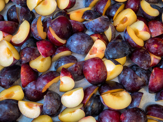 Purple plums cut in quarters