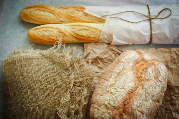 White bread, rustic fabric and a paper
