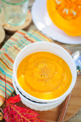 Pumpkin Cream Soup in a White Bowl