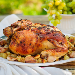 Whole Roast Chicken with Grapes, Garlic and Almonds