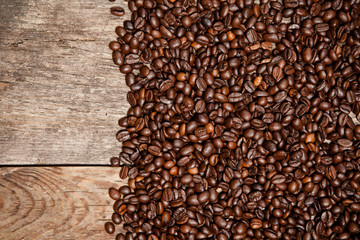 Coffee beans on wood table