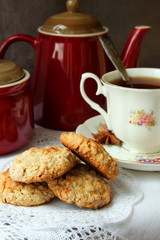 Homemade oatmeal cookies and a cup of tea.