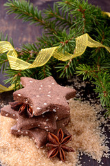 Chocolate homemade Christmas cookies in the shape of stars with