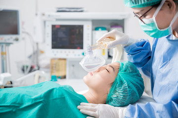 Young female patient receiving artificial ventilation