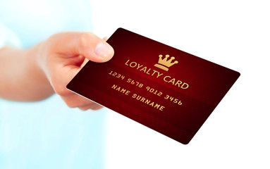 hand holding loyalty card isolated over white