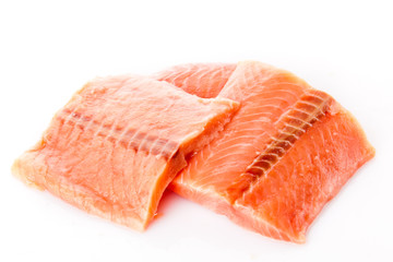 fresh salmon steak over white background