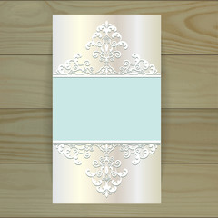 Luxury elegant card on wooden background.