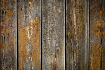 wooden background with weathered wood and ruusty nails