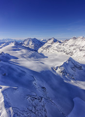 Valley and mountain ridge in Jungfrau region helicopter view in