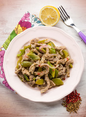 meat stew with capsicum red pepper and cilantro