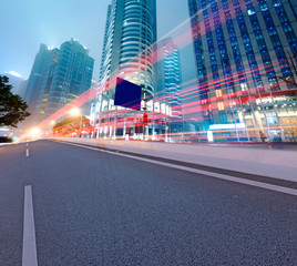 Obraz premium Asphalt road and modern city